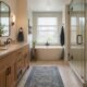Bathroom renovation with oak vanity soaking tub glass shower and precise tile work in Queens